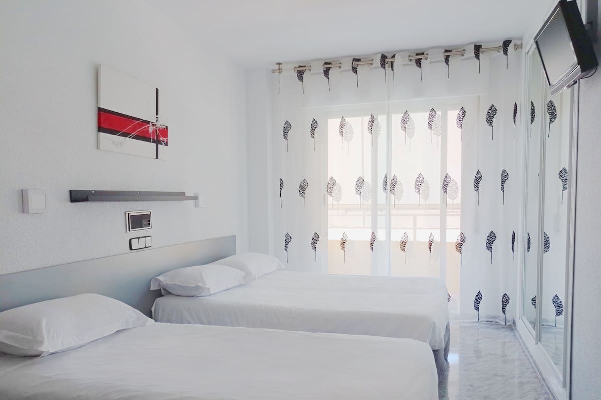 Family Triple Room, Balcony | Free WiFi, bed sheets