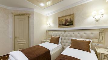 Economy Double or Twin Room | Minibar, in-room safe, desk, soundproofing