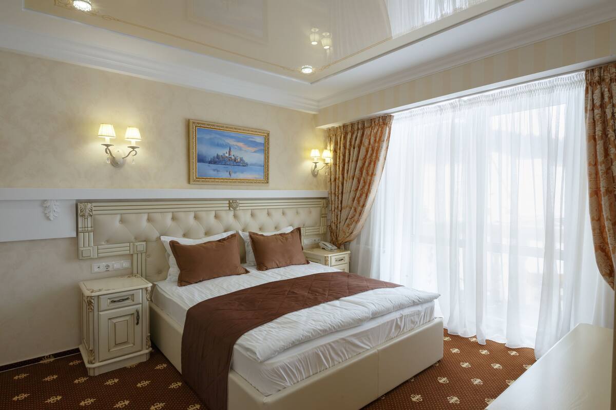 Family Apartment, Balcony, Mountain View | Minibar, in-room safe, desk, soundproofing