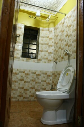 Apartment, 2 Bedrooms | Bathroom | Shower, rainfall showerhead, free toiletries, towels - At Home With Karuris (Eldoret)