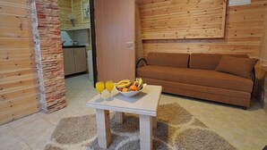 Family Studio, Multiple Beds, Pool View | Living room | Flat-screen TV - zimer lavi (Hazor Haglilit)