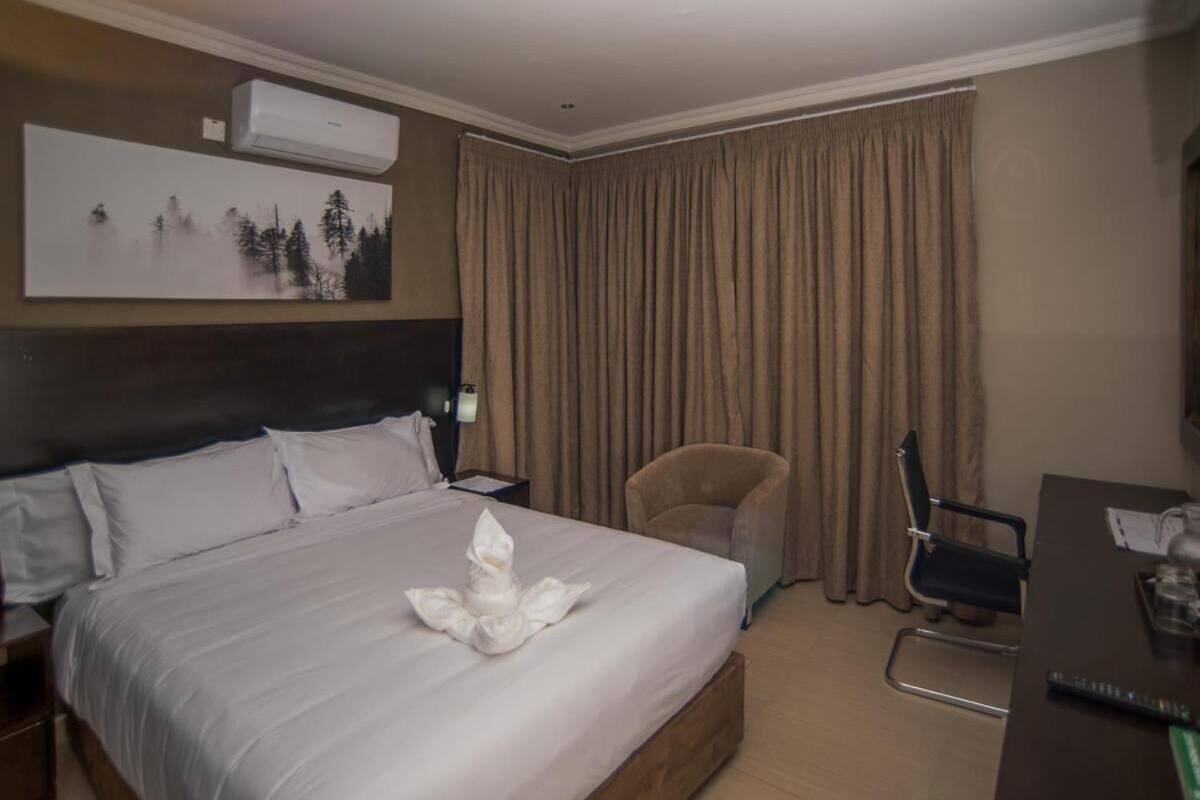 Luxury Double Room, 1 Bedroom, Non Smoking, Garden View | 1 bedroom, down duvets, in-room safe, blackout curtains