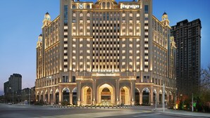 A large, ornate hotel with a classic architectural style, featuring multiple towers and a grand entrance. - Sheraton Yinchuan (Yinchuan)