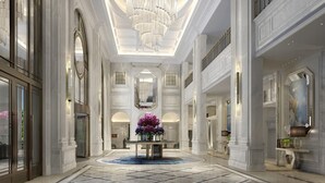 A grand lobby with a central round table, large chandeliers, and classical architecture. - Sheraton Yinchuan (Yinchuan)