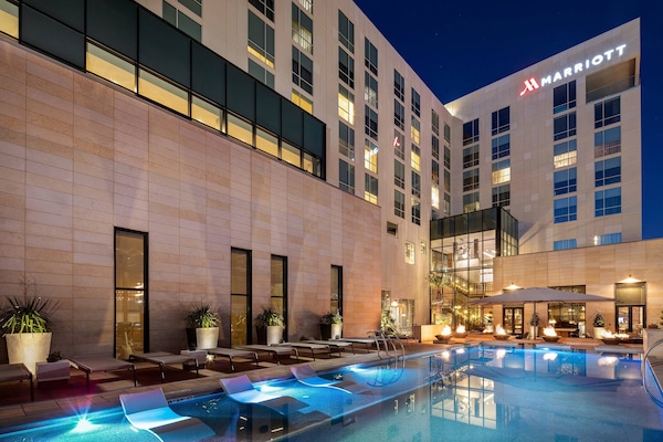 Outdoor pool, open 10:00 AM to 10:00 PM, pool cabanas (surcharge)