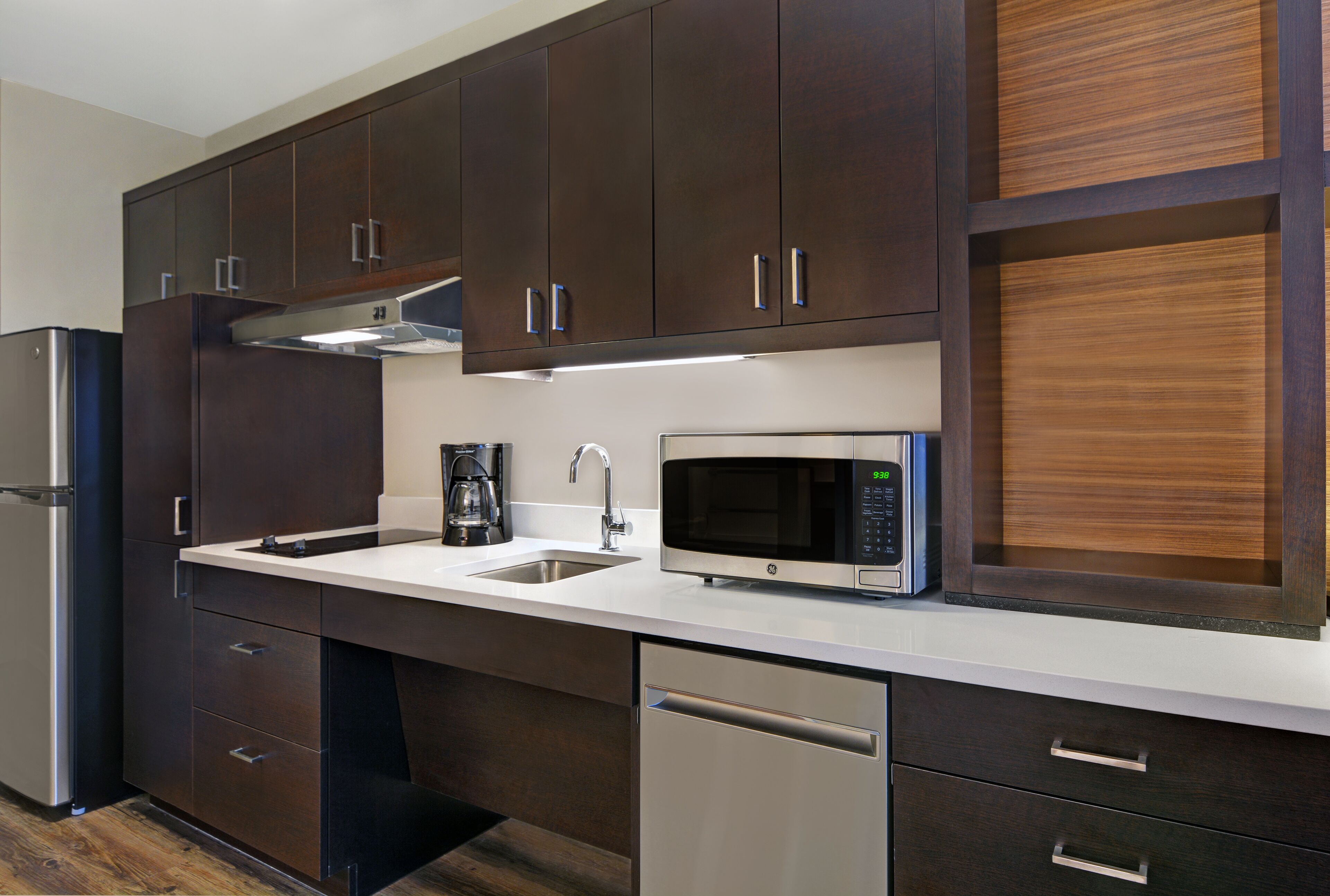 full-sized fridge, microwave, dishwasher, coffee/tea maker