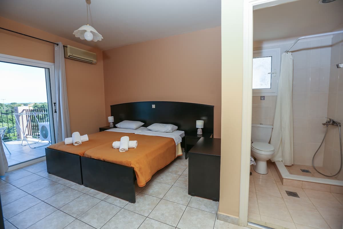 Camera con letto matrimoniale o 2 letti singoli | 2 camere, una cassaforte in camera, Wi-Fi gratuito