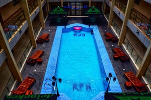 Outdoor pool, pool umbrellas, sun loungers