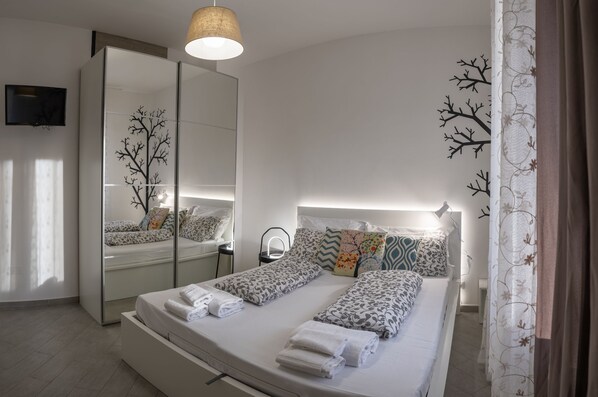 1 chambre, fer et planche à repasser, Wi-Fi gratuit, draps fournis