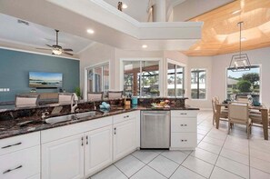 Fridge, microwave, oven, stovetop - Cape Vista Tropical Waterfront Vacation Home Cape (Cape Coral)