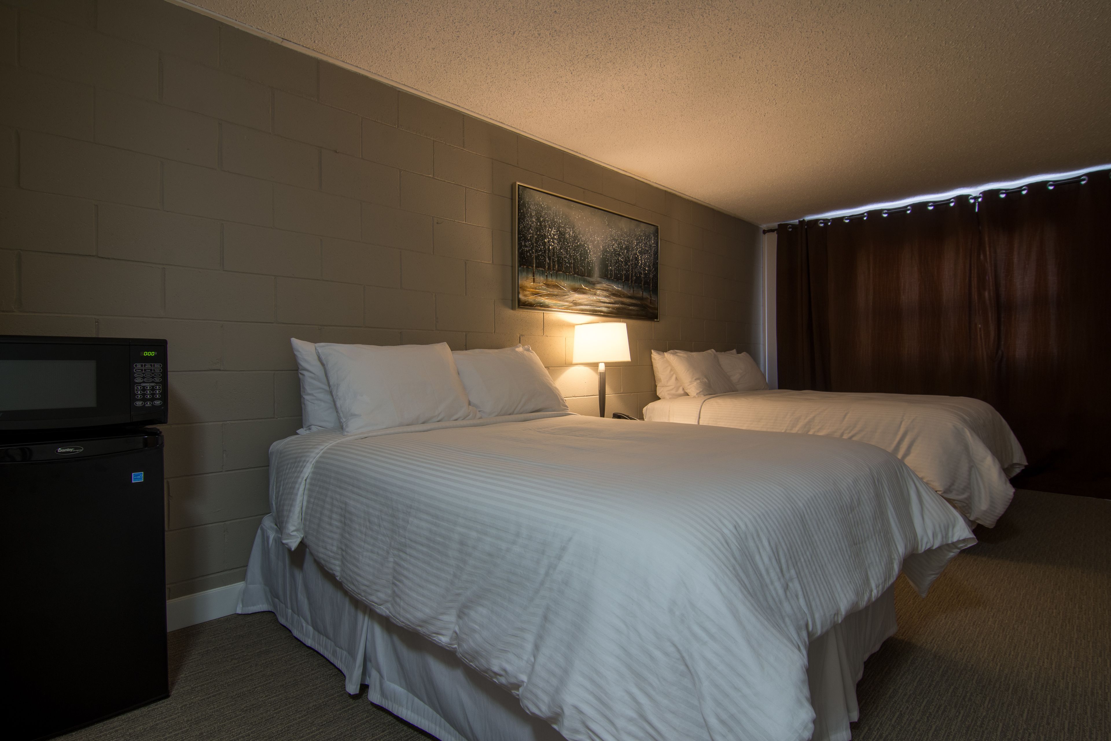 double room, 2 queen beds | blackout curtains, iron/ironing board, free wifi, bed sheets