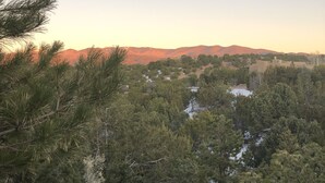 A mountainous landscape with a view of a valley and a river. - Luxury Guesthouse w Views, Private Sauna & Hot Tub- 30 day minimum. (Santa Fe)
