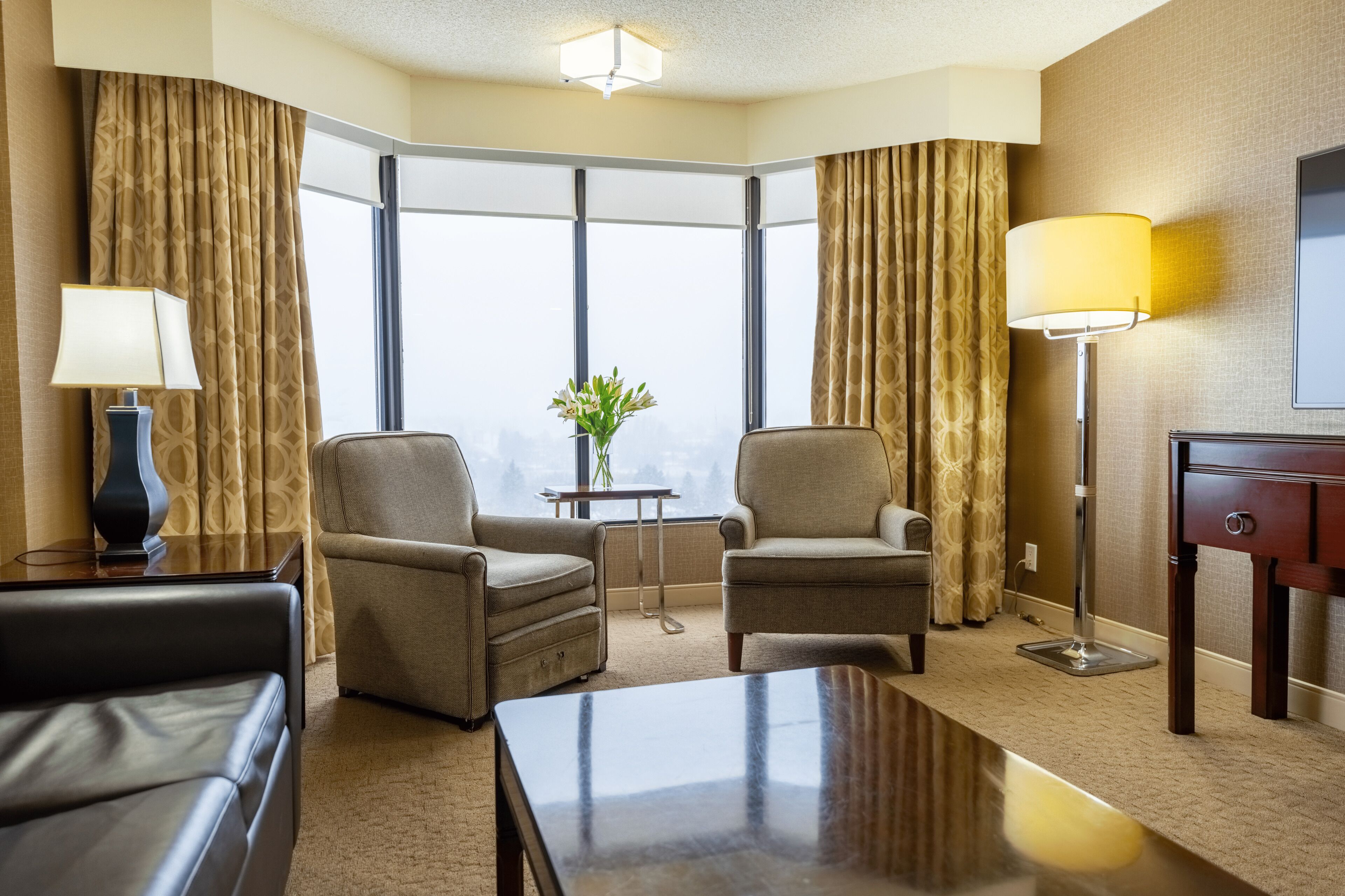 one bedroom suite | living area | flat-screen tv, pay films