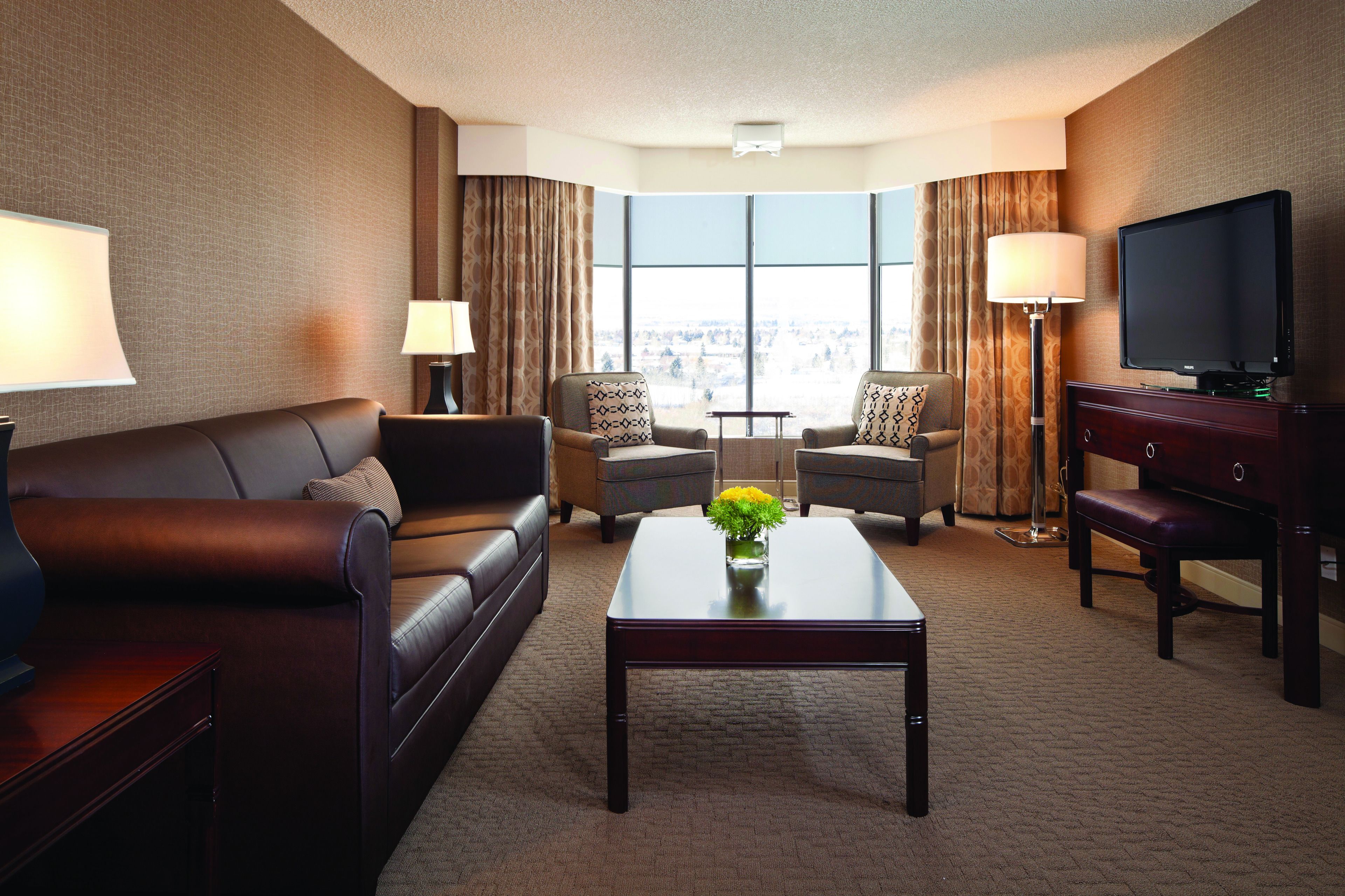 one bedroom suite | living area | flat-screen tv, pay films