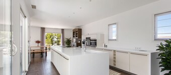 villa with pool facing Saint Thomas golf course