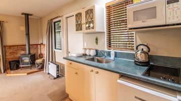 Fridge, microwave, toaster, cookware/dishes/utensils