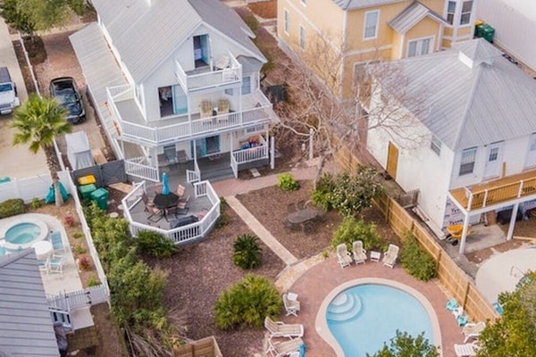 This beach house has a huge, private, gated yard with a heated pool.