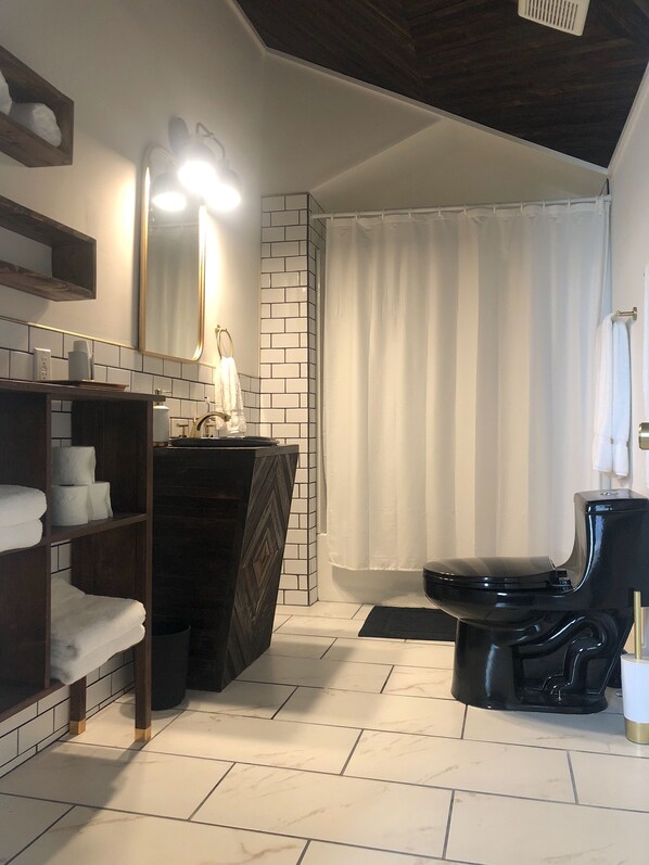 Hair dryer, towels, soap, shampoo