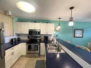 Fridge, microwave, oven, stovetop - Your Home Away From Home! Two bedroom condo on the ground floor. (Waikoloa Village)