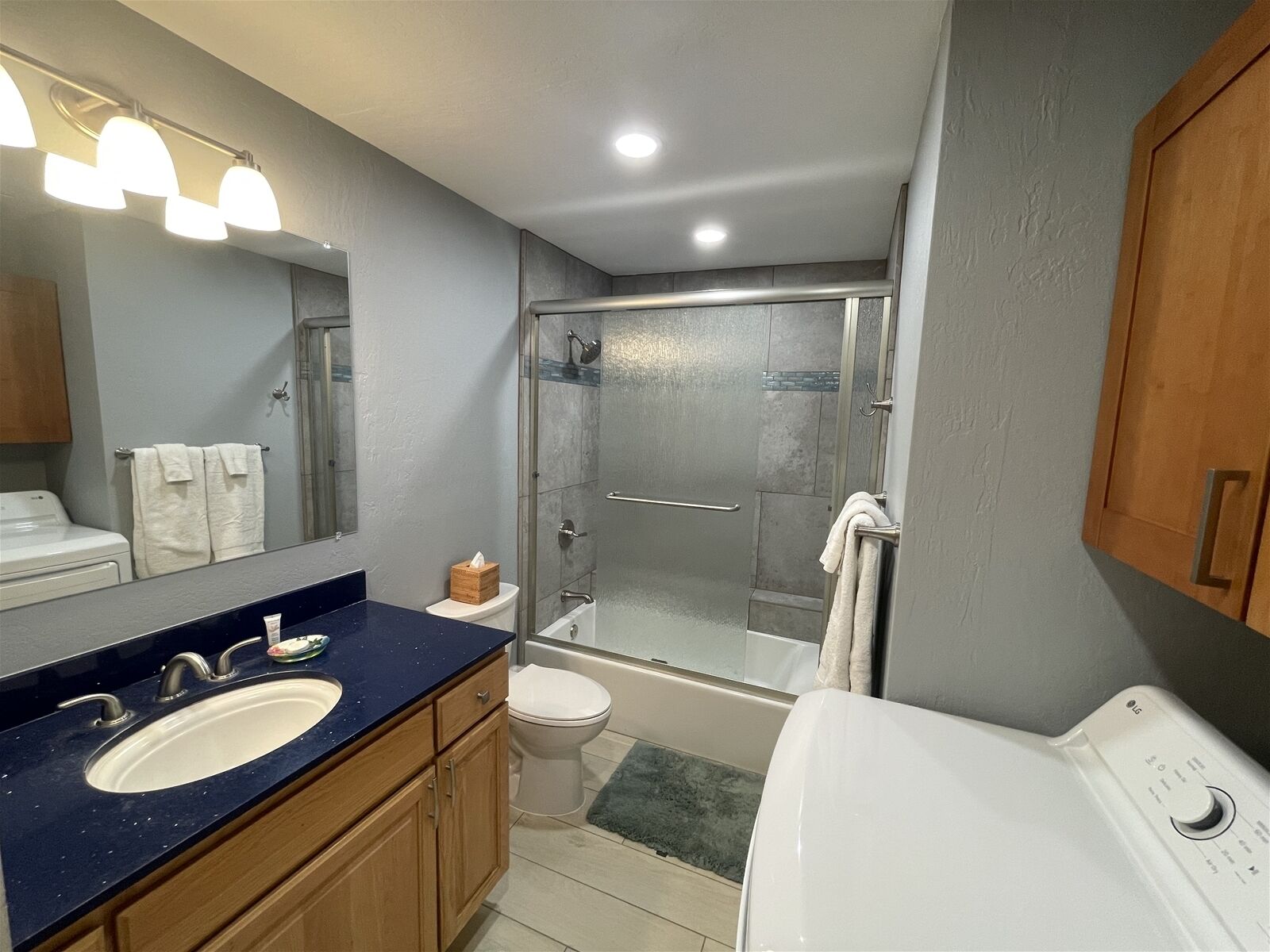 Bathtub, hair dryer, towels