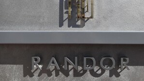 A building sign with the name "RANDOR" in large letters.