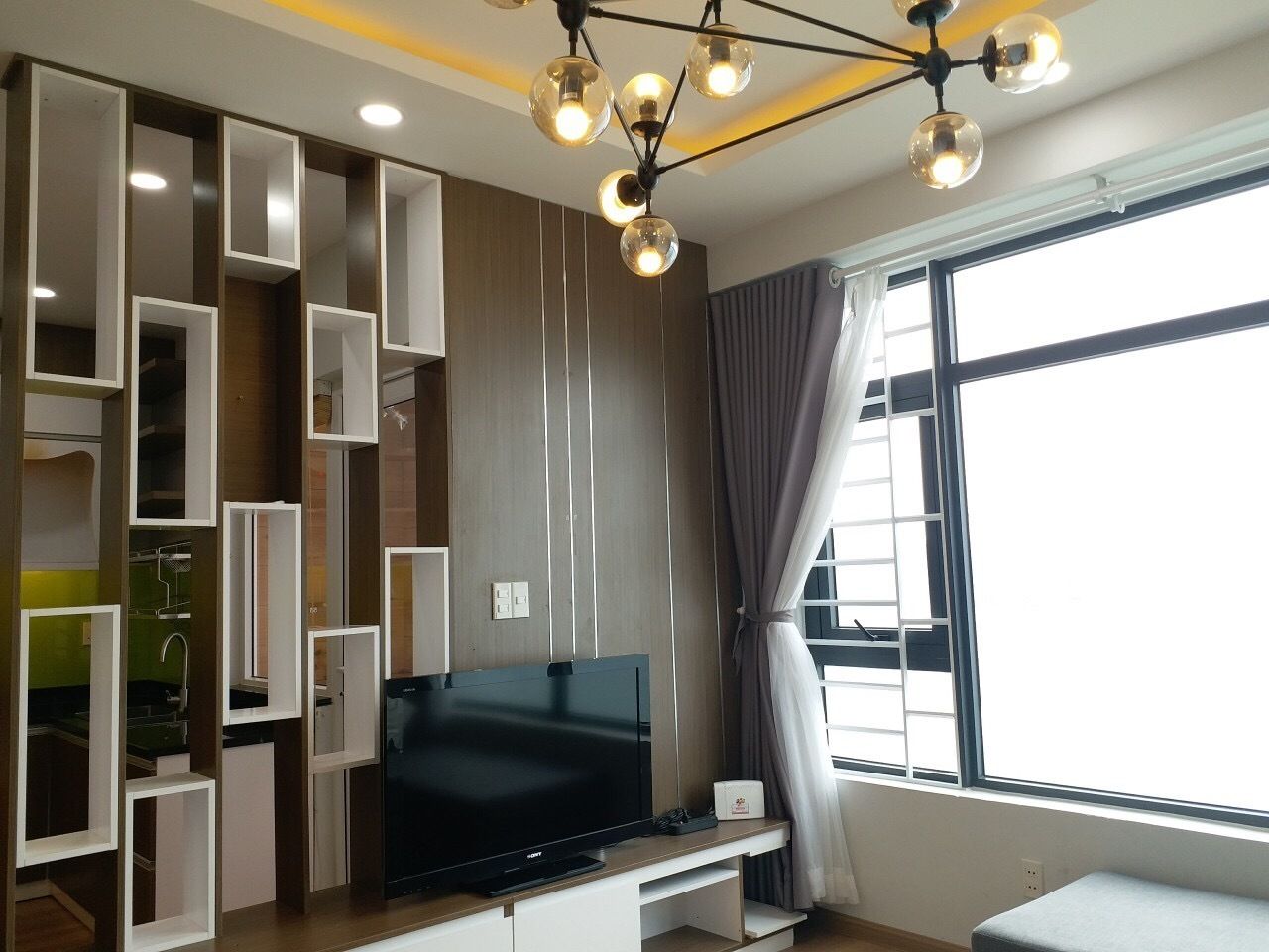 An's Houze Condo | Living room | Flat-screen TV
