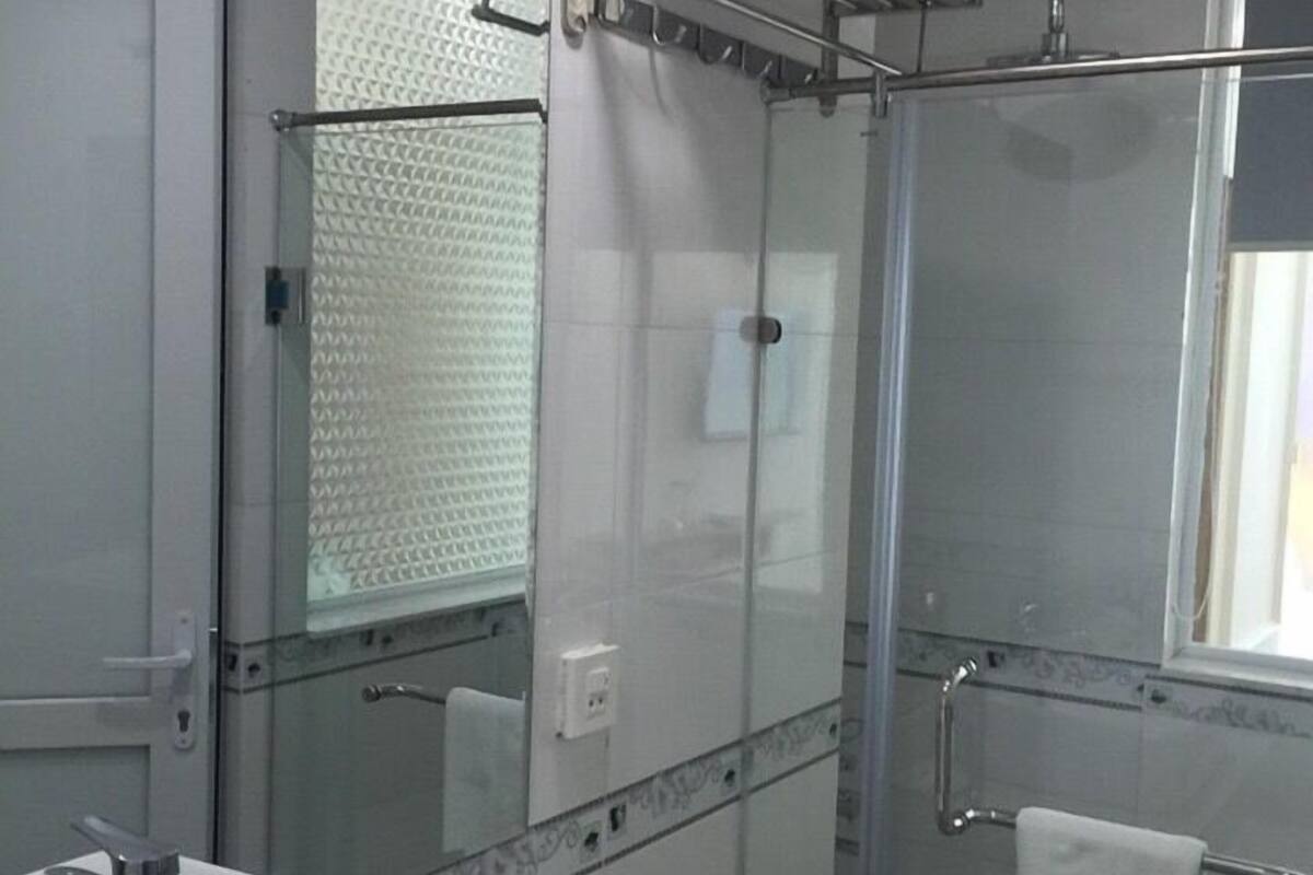 Shower, free toiletries, hair dryer, slippers