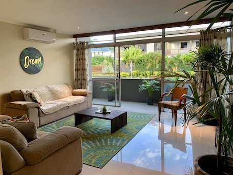 House, 3 Bedrooms | Living area | Flat-screen TV. Kidsfirst Apartment 4