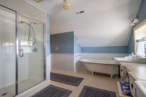Bathtub, hair dryer, towels, soap