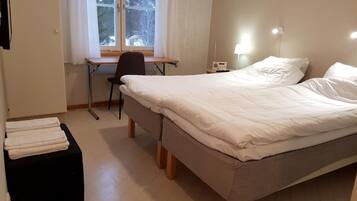 Comfort enkelrum - 2 enkelsängar - privat badrum | Skrivbord, arbetsyta för laptop, gratis wi-fi och sängkläder