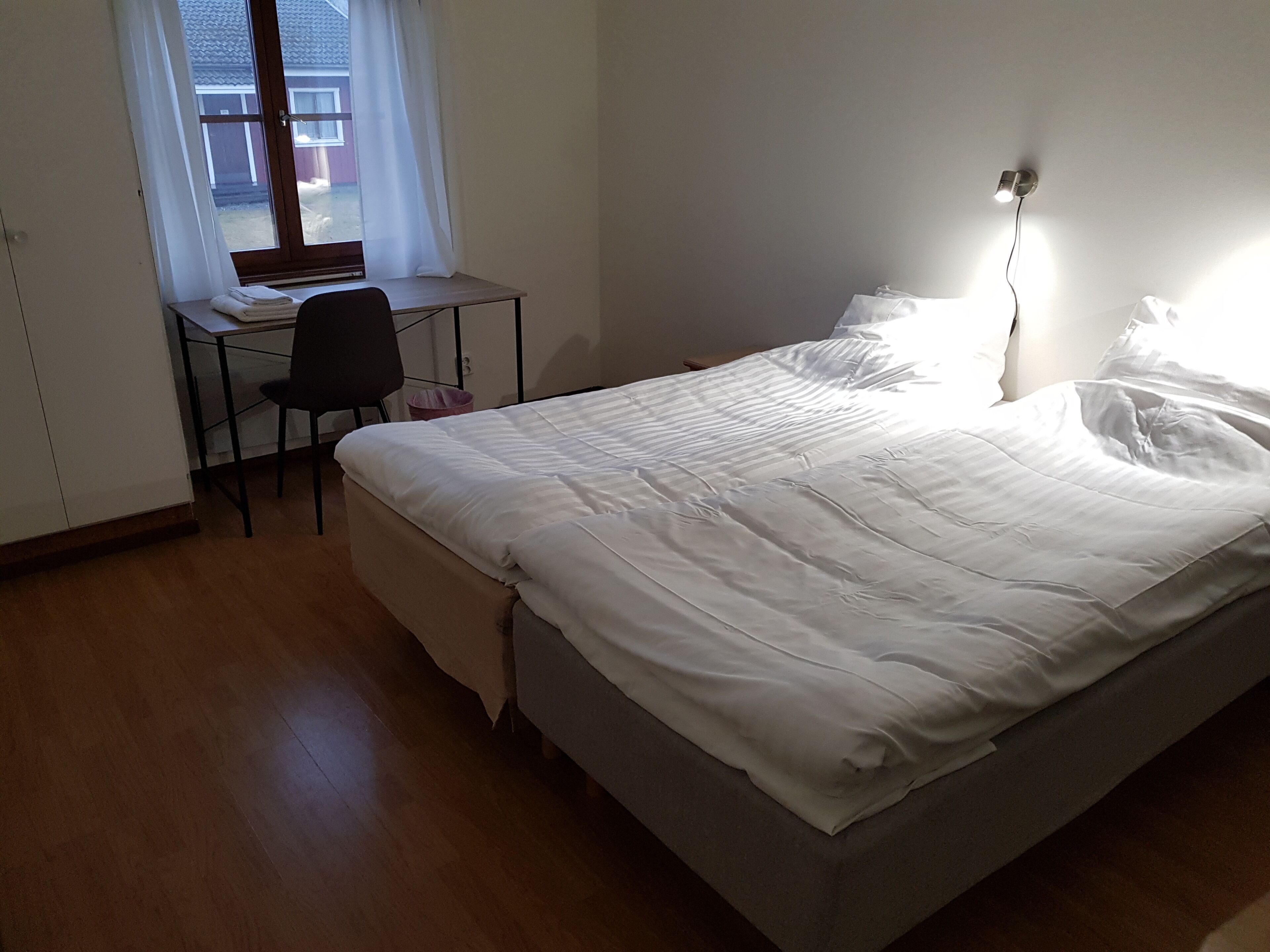 Desk, laptop workspace, free WiFi, bed sheets