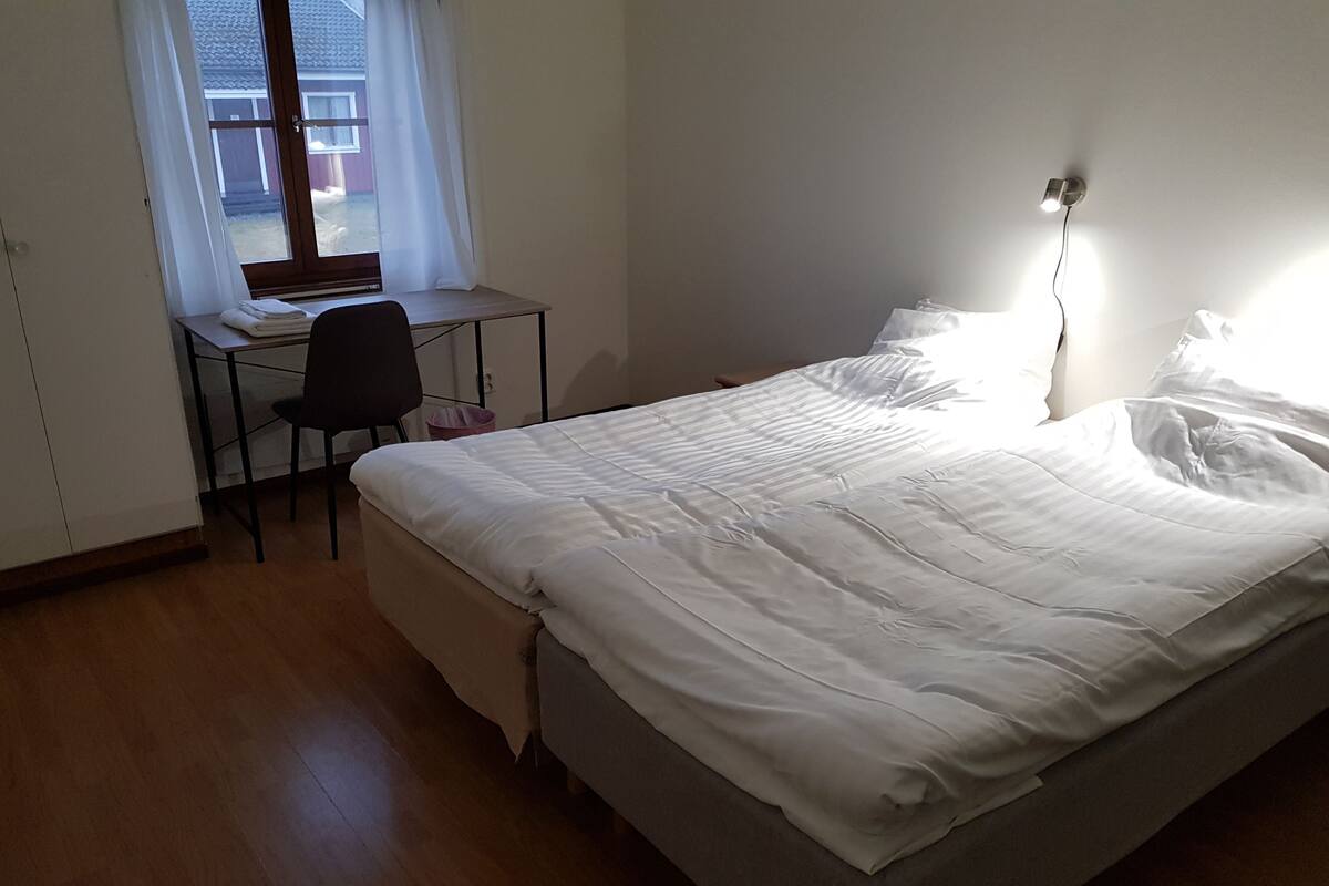 Desk, laptop workspace, free WiFi, bed sheets
