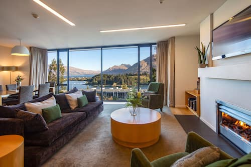 Apartment, 3 Bedrooms, Lake View | Living area | 49-inch Smart TV with digital channels, fireplace, streaming services