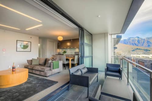 Apartment, 2 Bedrooms, Balcony, Lake View | Living area | 49-inch Smart TV with digital channels, fireplace, streaming services