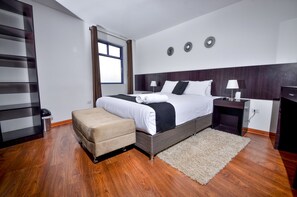 Exclusive Suite, Jetted Tub | Desk, laptop workspace, blackout drapes, iron/ironing board