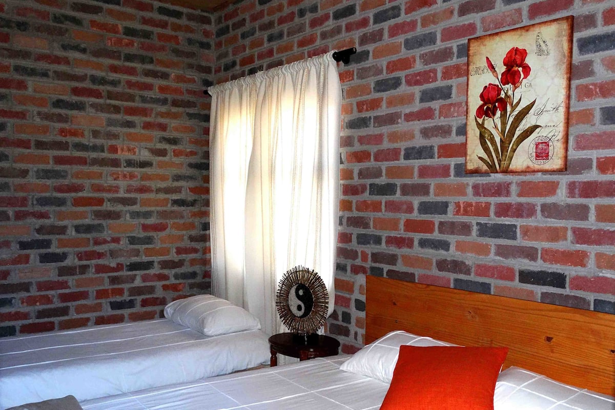 Family Room | Blackout drapes, iron/ironing board (on request), WiFi (free)