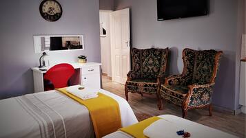 Doppel- oder Zweibettzimmer, Gartenblick | Zimmersafe, individuell dekoriert, individuell eingerichtet