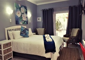 Double or Twin Room, Garden View | In-room safe, individually decorated, individually furnished, desk