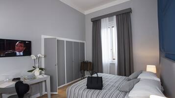 Superior Double Room | Minibar, in-room safe, desk, blackout drapes