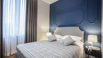 Standard Double Room | Minibar, in-room safe, desk, blackout drapes