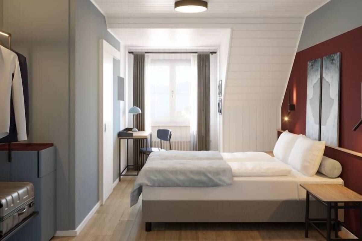 Ropa de cama de alta calidad, minibar, caja fuerte y escritorio