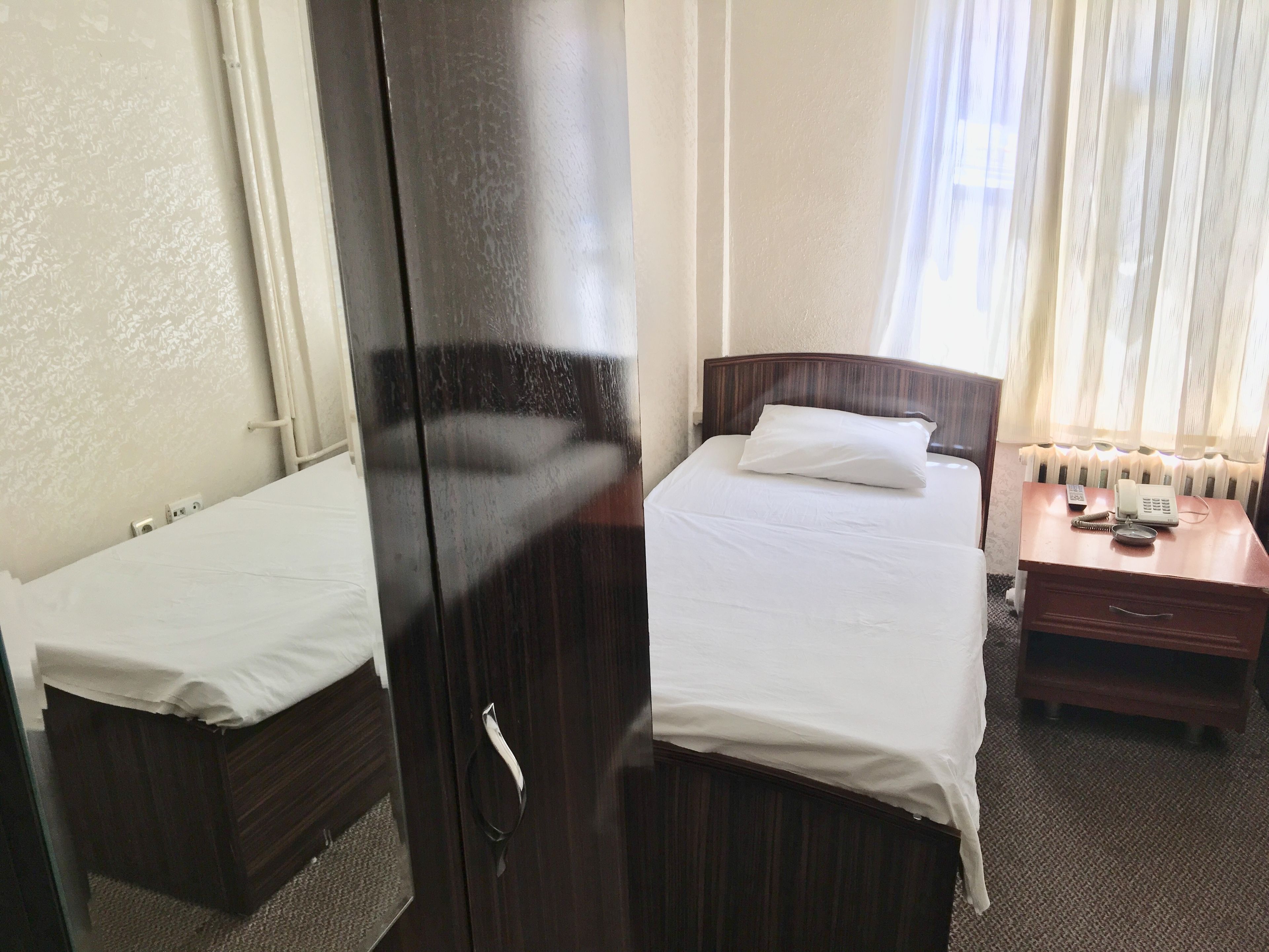 standard twin room | in-room safe, desk, iron/ironing board, rollaway beds