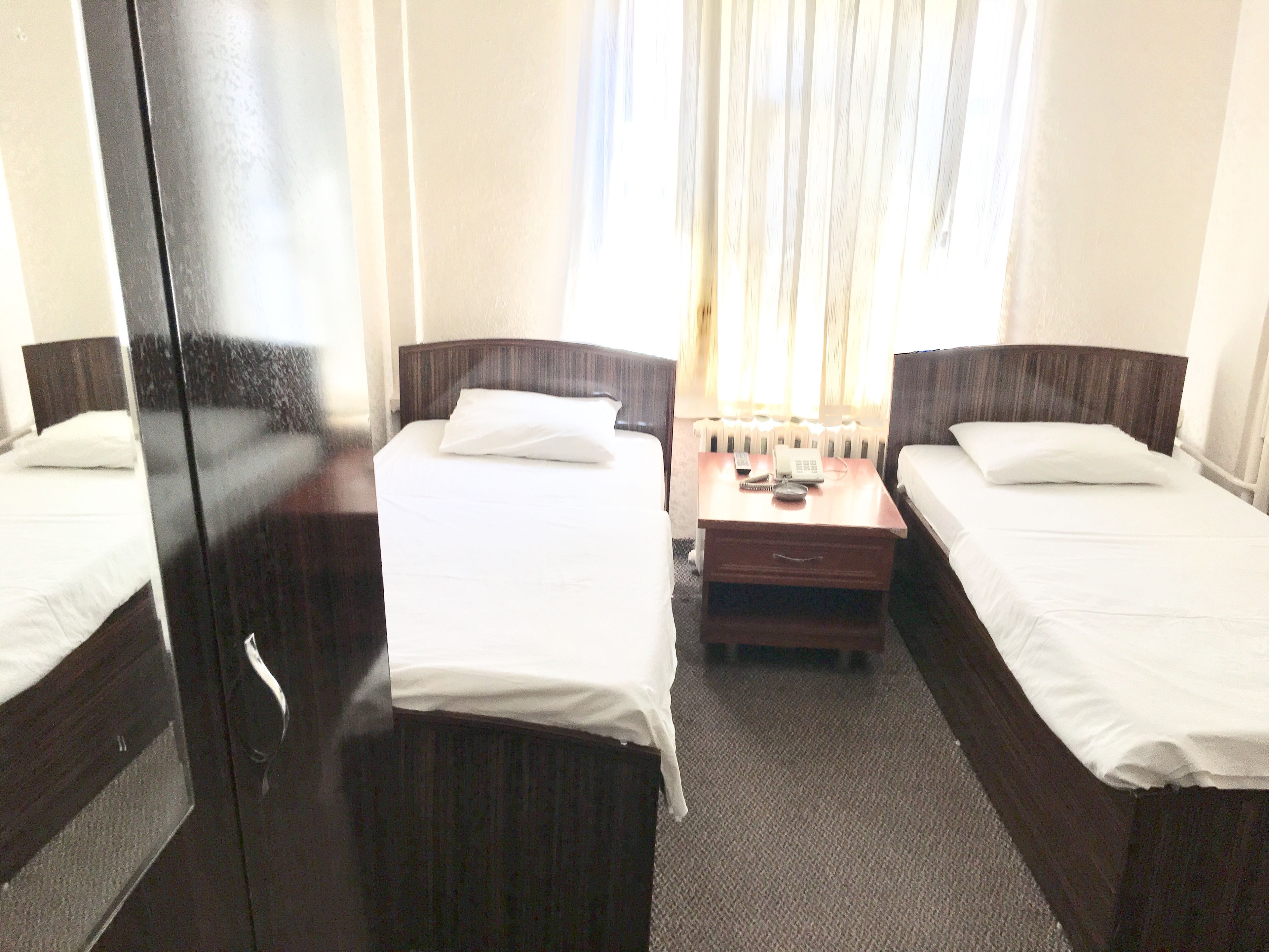 standard twin room | in-room safe, desk, iron/ironing board, rollaway beds