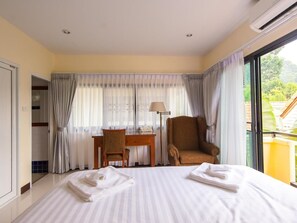 In-room safe, individually decorated, desk, blackout curtains