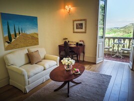 Superior Suite, Balcony, Valley View | Living area | Flat-screen TV