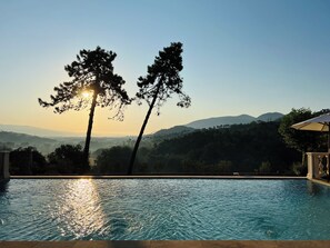 Outdoor pool, open 10:00 AM to 6:30 PM, pool umbrellas, sun loungers