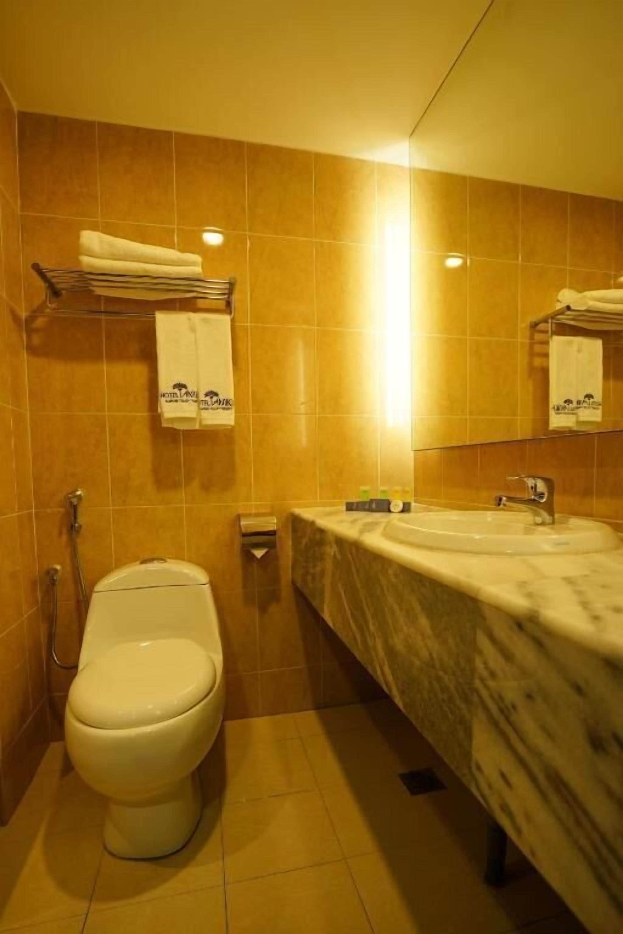 free toiletries, hair dryer, slippers, bidet