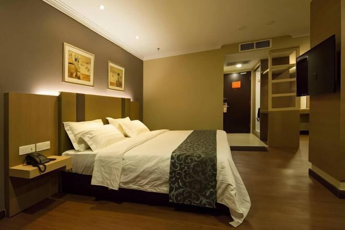 Minibar, desk, laptop workspace, iron/ironing board