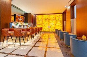 2 bars/lounges, rooftop bar, lobby lounge