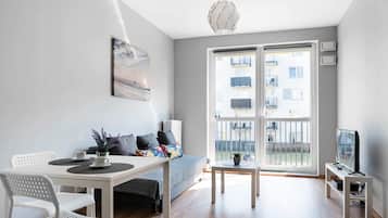 Comfort Apartment, 1 King Bed with Sofa bed | Living room | Flat-screen TV